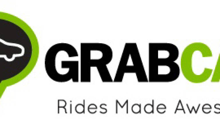 Grabcar drivers to benefit from MoU with Perodua