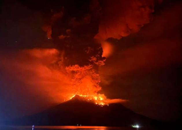 Mount Ruang releasing hot lava and smoke in Sangihe Islands as seen from Sitaro, North Sulawesi. - AFP PHOTO / CENTER FOR VOLCANOLOGY AND GEOLOGICAL HAZARD MITIGATION/ PVMBG