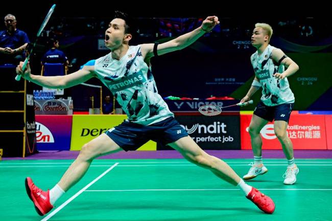 Malaysia’s Aaron Chia (R) and Soh Wooi Yik play a point during their men’s doubles group stage match against Denmark’s Kim Astrup and Anders Skaarup Rasmussen at the Thomas and Uber Cup badminton tournament in Chengdu, in southwest China’s Sichuan province on April 30, 2024 // AFPPIX