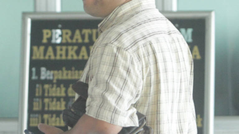 Enforcement officer charged with cheating company owner of RM3,000
