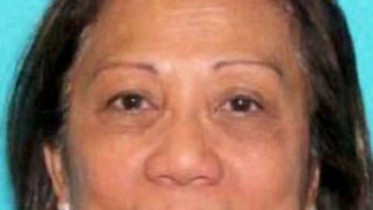 Las Vegas shooter's girlfriend back in US, FBI to question her
