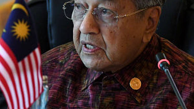 Toll-free roads not possible: Mahathir