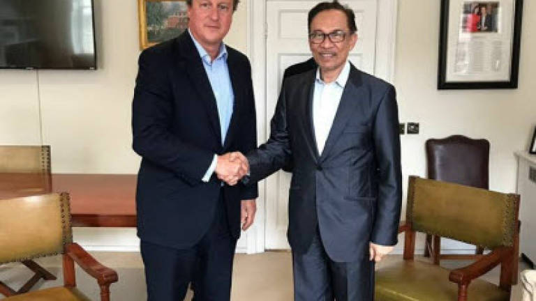 Anwar meets former UK premier David Cameron in London