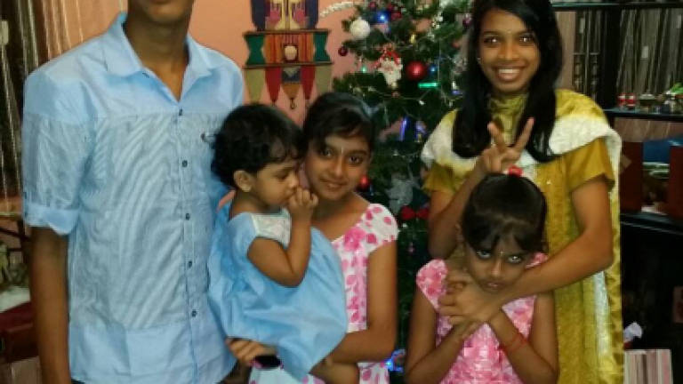 Nhaveen's family vows to fight on against bullying