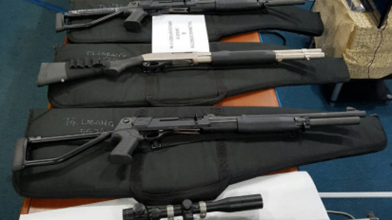 Police seize seven firearms from house of Datuk in Miri