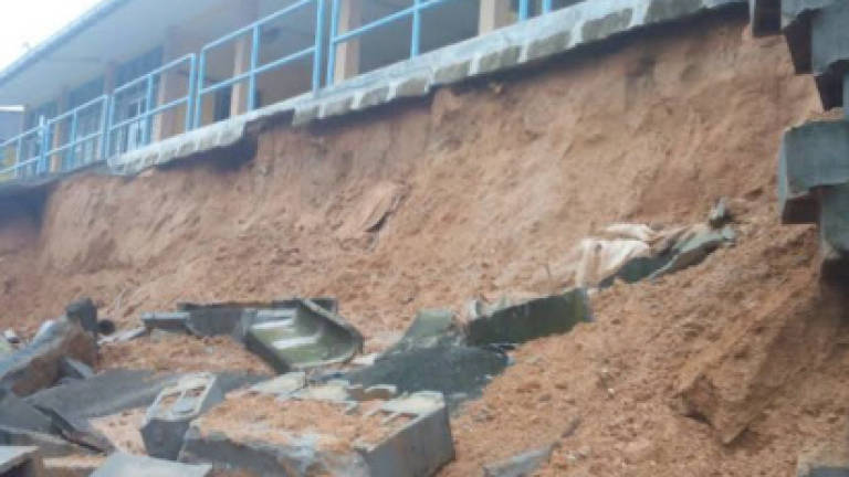 Retaining wall of school collapses after downpour