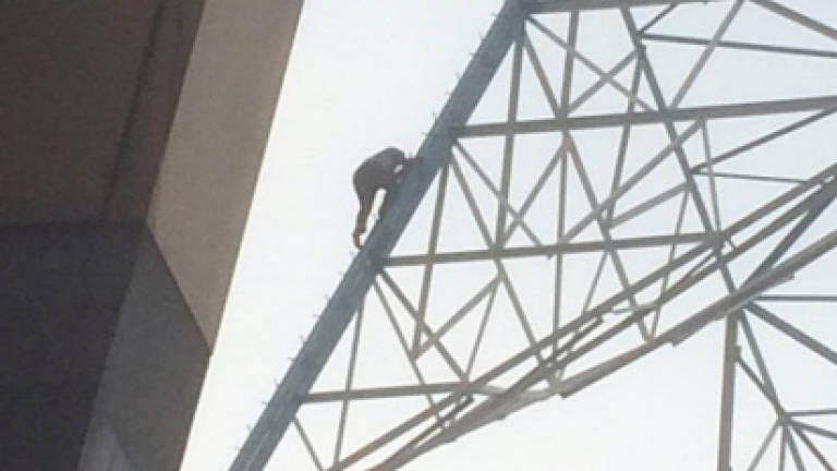 Man climbs TNB pylon in Bangsar for birthday selfie