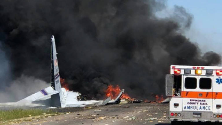 Nine aboard US military plane destroyed in fiery crash