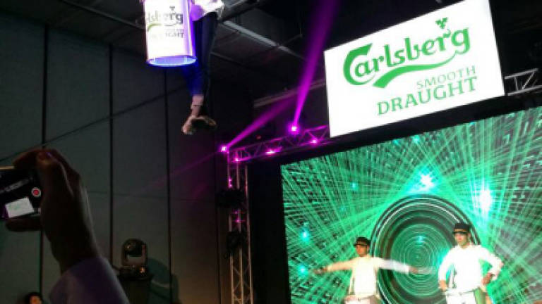 Carlsberg launches easy ring-pull 'POP cap' to its Smooth Draught bottles