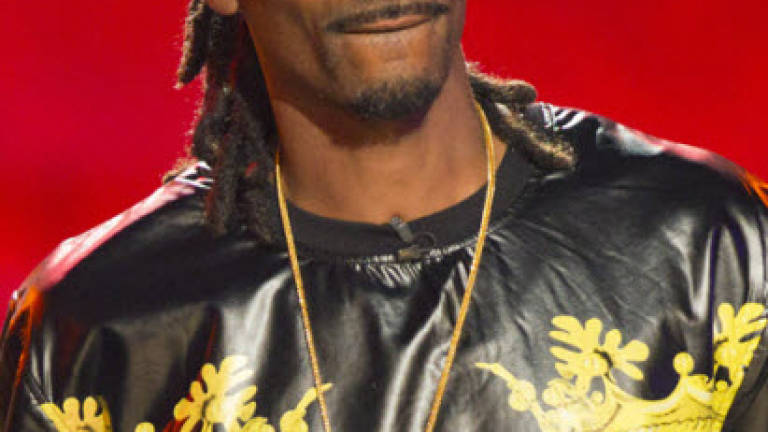 Snoop Dogg makes Paris Fashion Week debut