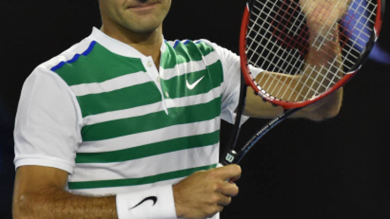 Idol Laver's support motivating Federer