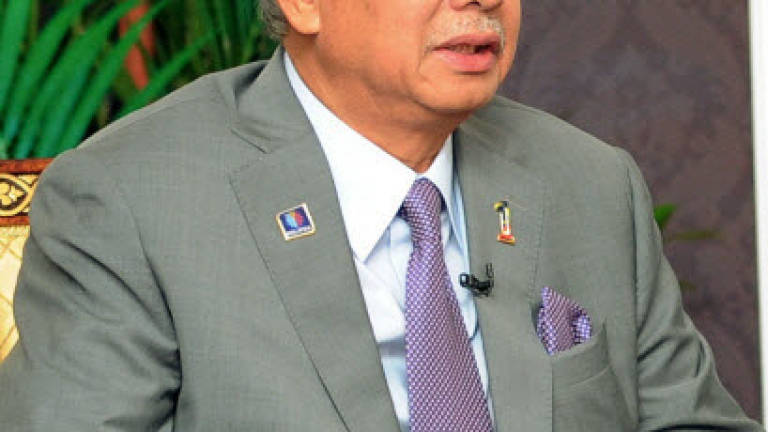 Tanjong, Bukit Bendera Umno divisions support Najib