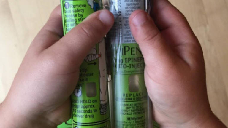 After backlash, EpiPen maker to help reduce patient costs