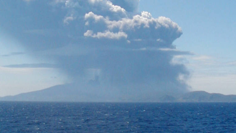 Japan evacuates island after volcano erupts