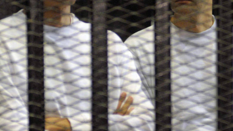 Egypt court orders Mubarak's sons freed in graft case