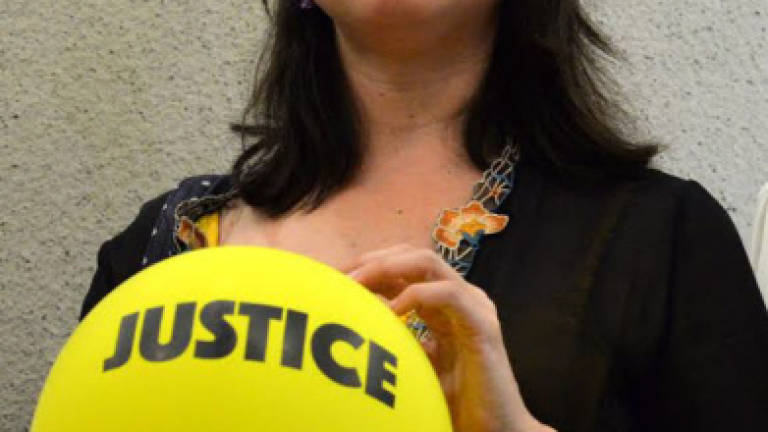 'Balloon girl' Bilqis Hijjas freed of insulting behaviour charge