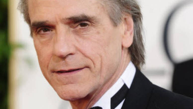 Jeremy Irons to return as Alfred in 'Justice League: Part One'