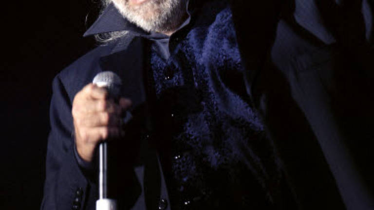 Larger-than-life Greek singer Demis Roussos dies at 68 Larger-than-life Greek singer Demis Roussos dies at 68