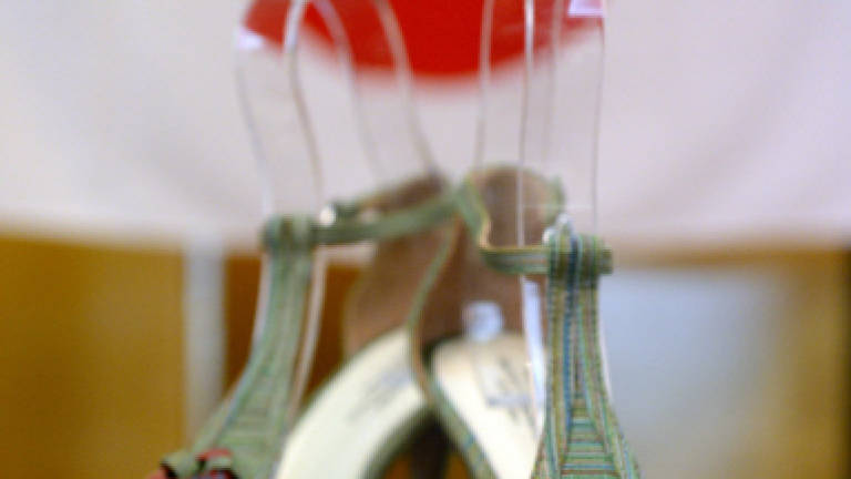 Jimmy Choo finds right fit with sole couture line Jimmy Choo finds right fit with sole couture line