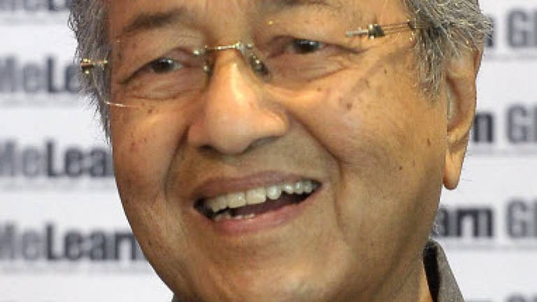 Tun M sings praises of DAP after attending party conference