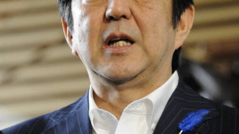Japan PM sends support message to war criminals service