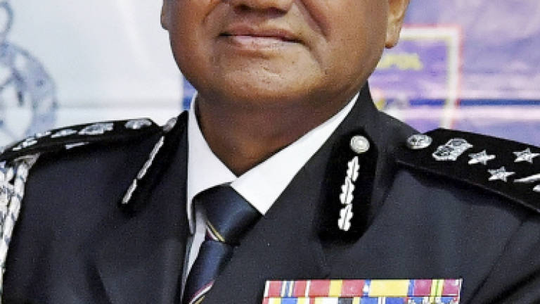 New IGP Mohamad Fuzi vows fight against terror