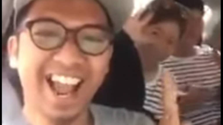 (Video) Grab drops rude driver who mocked tourists in viral video