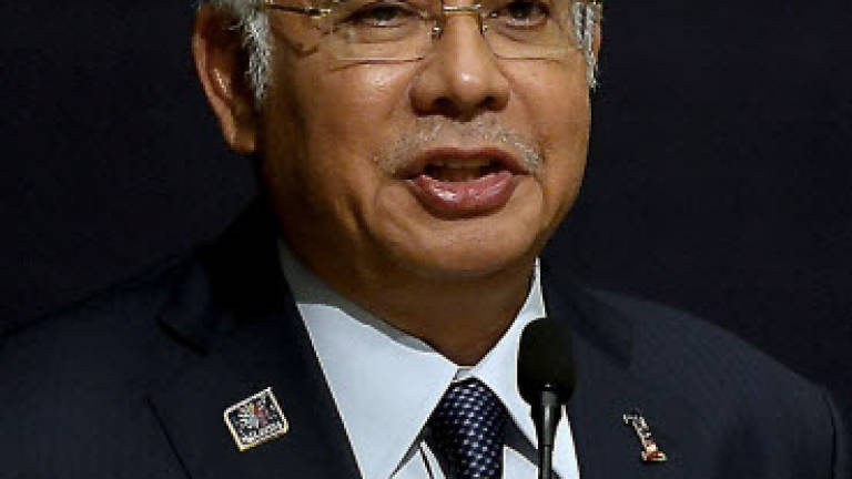 Najib wishes Happy Father's Day to all dads