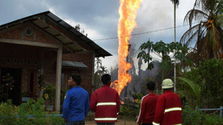 Indonesia oil well explosion kills 18, dozens injured (Updated)