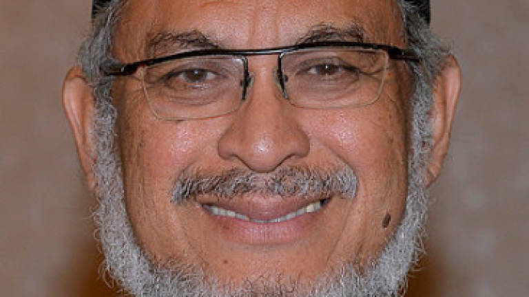 FT Minister Khalid Samad files lawsuit against activist