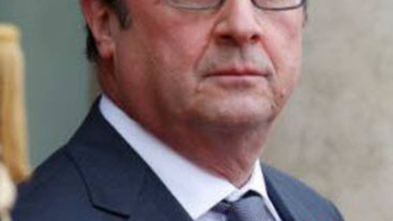 French president pardons woman jailed for killing violent husband