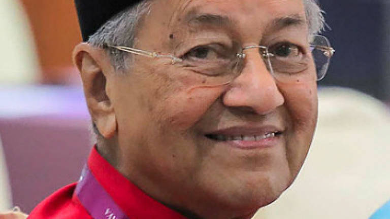 'I want people treated decently,' says Dr M over police raid at Najib's residence