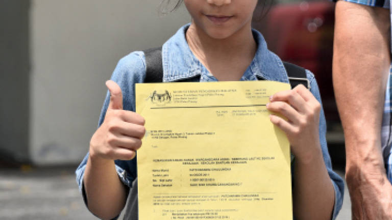 Seven-year-old half-Thai girl receives nod to attend school