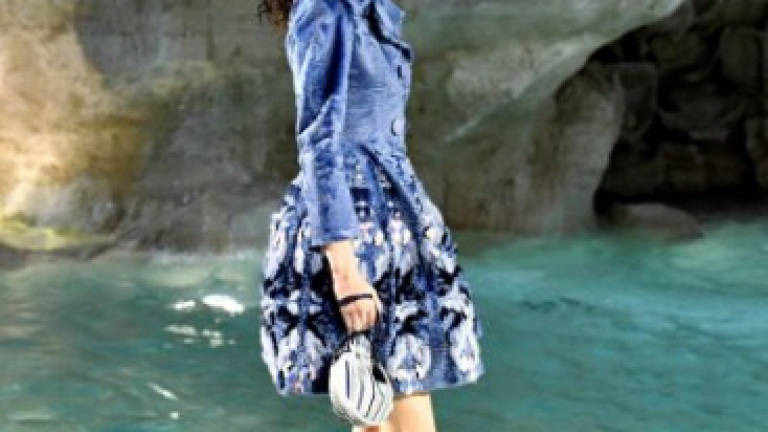 Fendi models walk on water in Rome's Trevi fountain