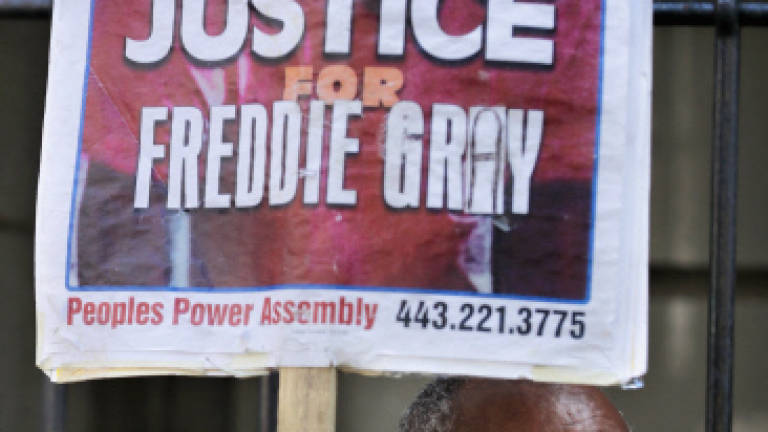 Baltimore officer cleared over Freddie Gray custody death