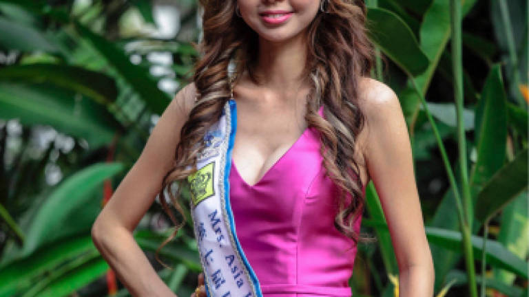 Beauty pageant winner fought her fears and remembered her country to win the crown