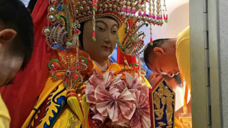 Chinese deities fly business class for SE Asia tour