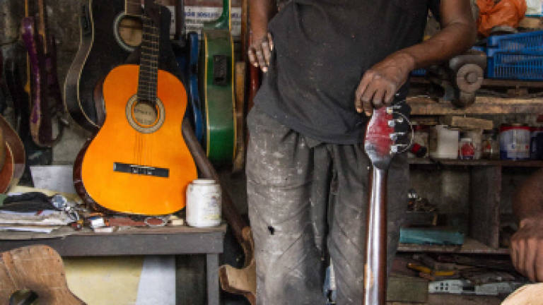The guitar maker of Kinshasa: Father of a unique sound