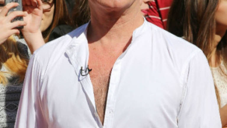 Simon Cowell spends £2,000 on a bath Simon Cowell spends £2,000 on a bath