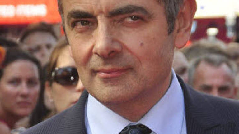 Rowan Atkinson pays out £16k for daughter's music career