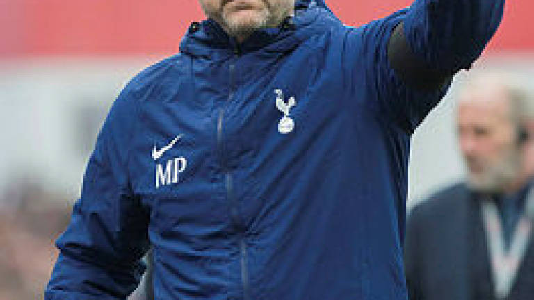 Pochettino ends speculation over Spurs future by signing new deal