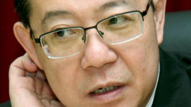 Publisher, author to pay RM250,000 in damages to Guan Eng, businessman