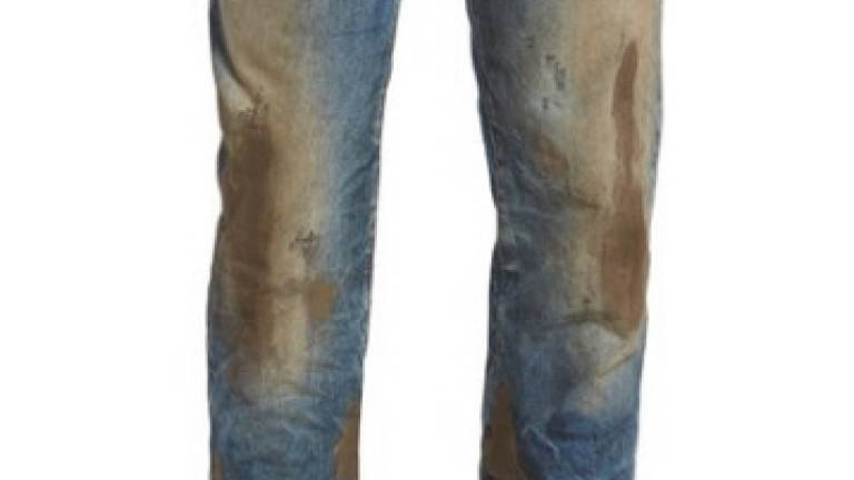 US$425 jeans coated with fake dirt go viral