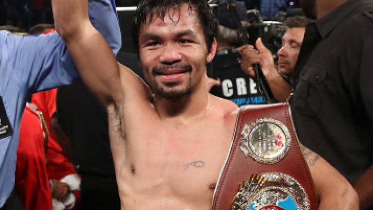 Pacquiao reclaims WBO title for third time