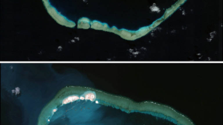 Philippines says Chinese reclamation damaged reefs