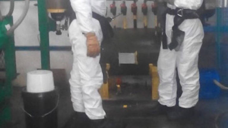 Firemen contain ammonia leak in ice-cream factory