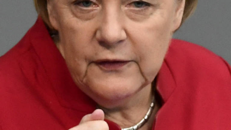 Merkel to be the new 'leader of the free world'?