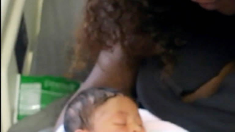 Serena Williams reveals baby to world in touching home movie (Video)