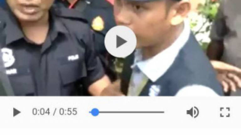 Video clip of EC officer with ballot paper is from 2013