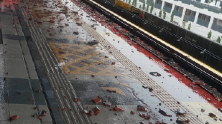 Portions of Kelana Jaya LRT station's roof blown by winds